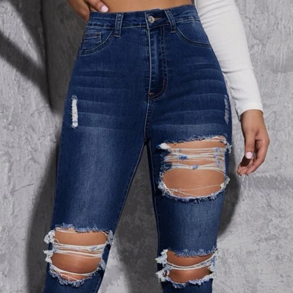 Dark washed ripped jeans